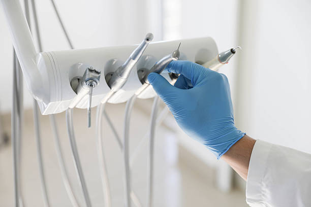 Professional Tooth Extraction technician working in Mercer County County, IL